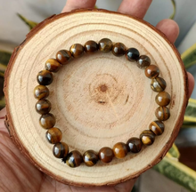 Load image into Gallery viewer, Original Tiger Eye Round Bead Bracelet for Protection, Courage &amp; Will Power
