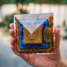 Load image into Gallery viewer, Seven Chakra Orgone Pyramid 3 inches in Transparent High Quality Resin
